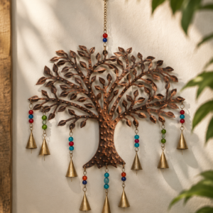 Handcrafted metal Tree of Life wall hanging with colorful beads and decorative antique-finish bells for elegant home décor.